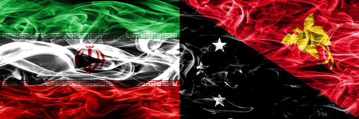 Iran vs Papua New Guinea smoke flags placed side by side. Thick colored silky smoke flags of...