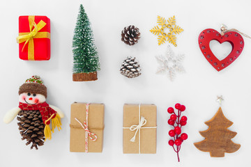 Christmas decoration with gift boxes and ornament on white background. Crative flat lay , top view