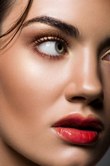 Naklejka premium close up of attractive model posing with makeup on face