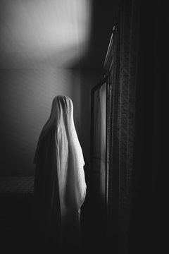 Person disguised as a ghost