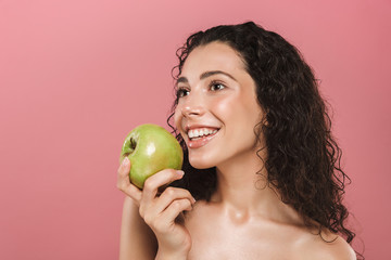 Beauty portrait of a smiling young topless woman