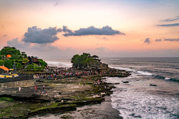 Sunset at Tanah Lot Temple on Sea in Bali Island