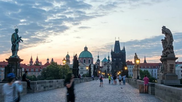 Charles Bridge in Prague before the sunrise, Bohemia, Czech Republic. red sky
