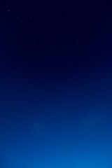 Fototapeta na wymiar 夜明け間際の星空 / 北海道美瑛町の風景