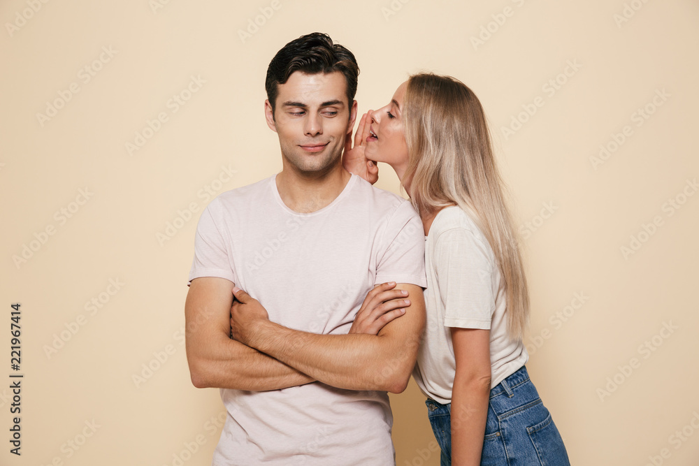 Sticker Portrait of a smiling young couple standing together