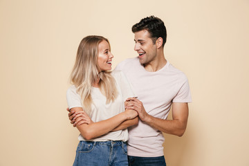 Portrait of a smiling young couple standing together