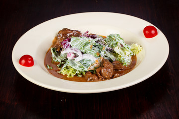 Beef with iceberg salad