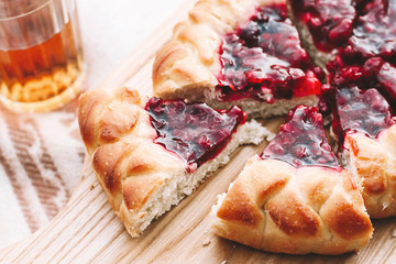 Berry pie and glasses of tea. Picnic concept
