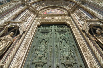 View on the main entrence of the Cathedral of Santa Maria in Florence, Italy on a sunny day.