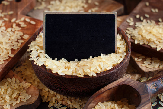 Parboiled rice with a small chalkboard