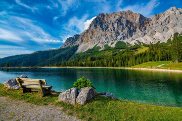 A beautiful view on the Ehrwalder Almsee and the Zugspitze on a sunny summer day in Austria,...