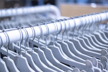 Clothing store, Clothes hang on a shelf