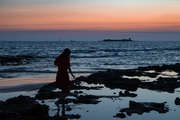 woman's silhoette at the sunset