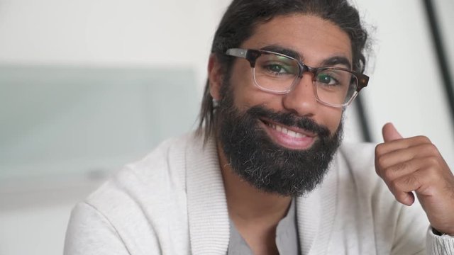 Portrait of bearded man with eyeglasses
