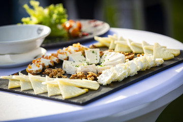 delicious cheese board with walnuts