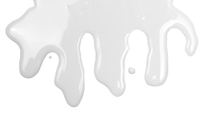Spilled milk puddle isolated on white background and texture, top view
