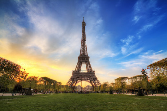 Beautiful dramatic spring sunset view of the Eiffel tower in Paris, France
