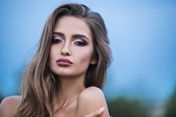portrait of gorgeous woman with chubby lips and glamour makeup