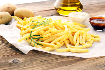french fries potato with ketchup and mayonnaise.