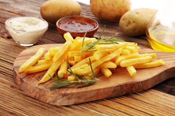 french fries potato with ketchup and mayonnaise.