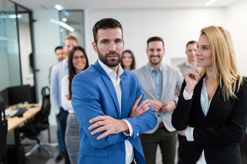 Group picture of business team posing in office