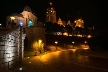 castle at night illuminated by lights in szczecin poland - obrazy, fototapety, plakaty