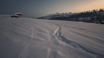 Path in snow and mountains