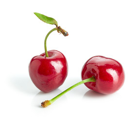fresh red cherries isolated on white background