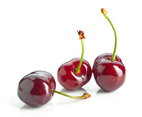fresh red cherries isolated on white background