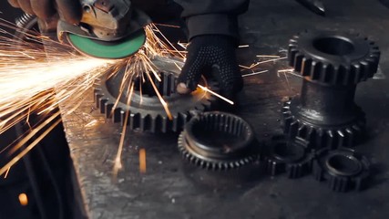 cleaning the metal gear from rust - Powered by Adobe