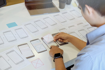 ux designer creative graphic planning application development a prototype smartphone layout.