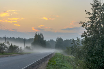 Drive out of town on a foggy autumn morning.