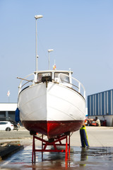 yacht boat in shipyard  for repair and maintenance in marina port