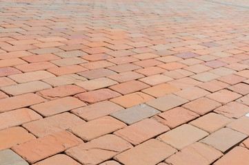 Pavement of red, dark red and orange bricks