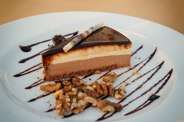 Serving cake three chocolates