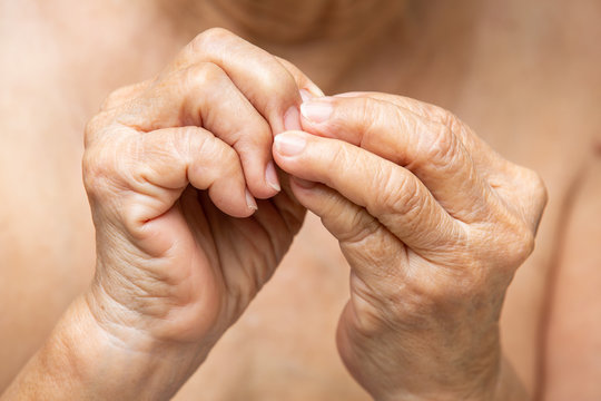 Senior woman nibbling nails, Close up, Body language feeling