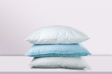 Soft Pillows Pile on grey background, three pillow, sleeping