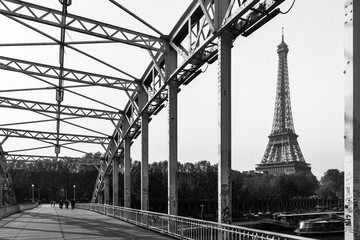 Beautiful view of the Eiffel tower from the Passerelle Debilly bridge in Paris in spring 