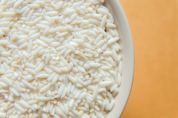 Background and wallpaper by pile of paddy rice and rice seed.