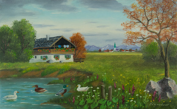Enten am Teich mit einem Haus vor einer Ortschaft