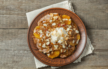 Pork in cider with rice. The view from the top. Copy-space.