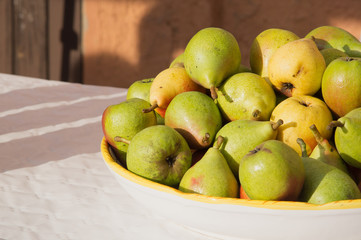 Fragrant ripe pears are harvested in the autumn on the market.