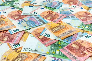 Scattered euro currency banknotes