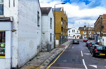 Old Lassell and Orlop street with buildings in british style at Greenwich. London. UK. Shot from Trafalger road