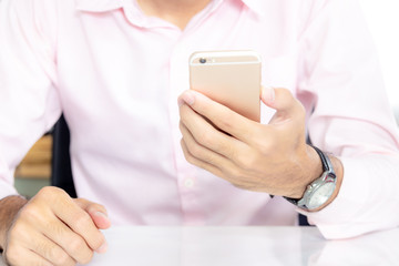 Man using smartphone ,He is talking to work
