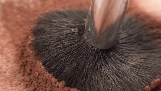 macro brush make-up artist with powder
