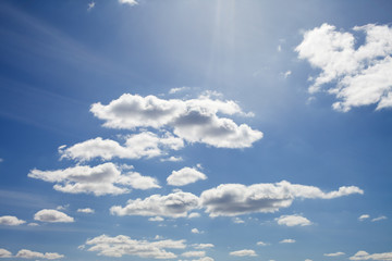 White fluffy clouds in the blue sky