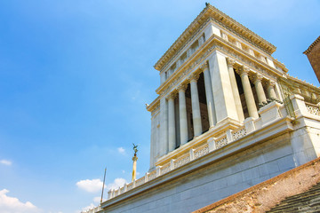 View on the Altare della Patria from the perspective of the Capitoline Hill stairs.
