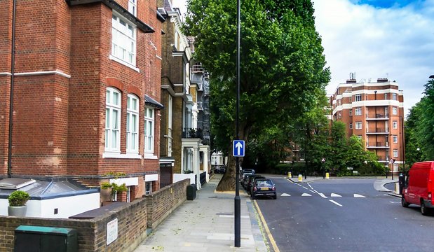 Red Brick Historic Buildings in English style on Addison road , Westminster. London.The name of the road derives from the essayist and statesman Joseph Addison (1672&ndash;1719)