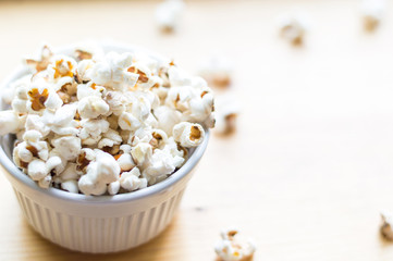 Popcorn on wooden table